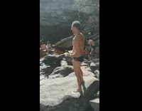 two girls hands up peace signs