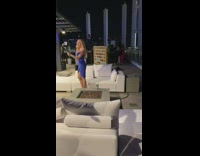 Blue dress giant connect four girl rooftop