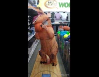 T Rex costume dribble basketball grocery cart