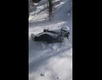 Man Skis Down on Top of Snow