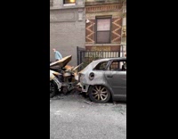 2 parked cars appear to have been burned 