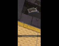 open packet on the rails of subway 