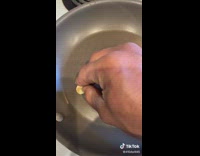 Guy does garlic egg hack fail in pan