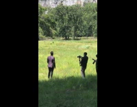 Man maroon formal attire prenup shoot grass park