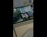 Four women in violet jersey top tiktok dance at the terminal