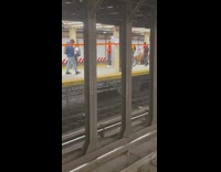 Man Rides a Bike in Subway Station