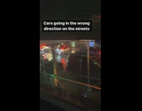 Cars drive in the wrong direction due to flood 