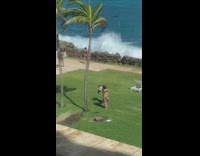 Woman in beach dress bend and twerks