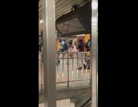 Guy plays saxophone to jazz music at subway station 
