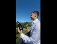 Guy use knife to pop champagne bottle