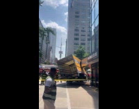 Truck stuck and crashed on corner store 