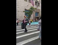 Person dressed as Trump controls the traffic