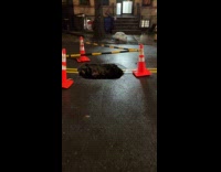 Collab WINY - Tree cones around huge hole on street