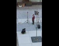 Red suit jacket photographer butt crack 