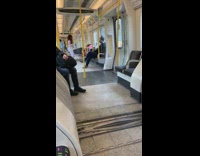 Woman white pants tiktok dance subway train