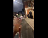 Woman made boyfriend stand beside street sign