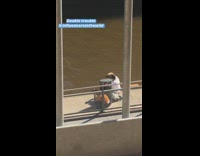 Girl brown shirt river two photographer can