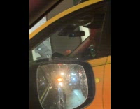 Collab WINY - Taxi driver make faces in front of filmer