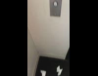 Coronavirus trash sign next to elevator