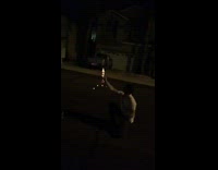 Guy lights firework rocket in his hand and it doesnt launch camera stops before it explodes