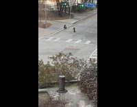 Girl bend over backwards street green stoplight