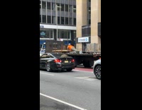 Man push ups on back of truck