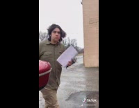 Guy in car pretends he got into an accident in school parking lot 