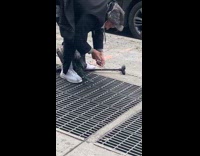Guy fishes phone out from underground 