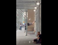 Man does pushup feet up on scaffolding