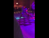 MUSIC Blue Shirt Fat Guy Dancing On Checkerboard Floor