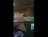 Guy driving car stuck behind cyclist freeway 