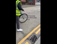 Guy learning to ride bike