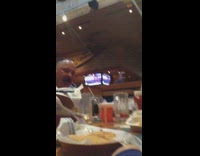 Family sings happy birthday to little boy who uses fingers to blow out candle