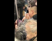 Guy picks nose hair during train ride