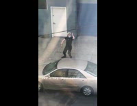 Man black shirt face mask brown paper bag tiktok dance sidewalk Part 4