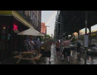 Guys in line dance outside restaurant rainbow 