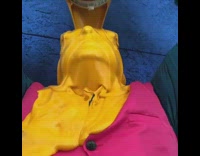 Pink vest guy pours yellow paint face