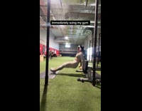 Woman exercises but gym equipment seat slipped