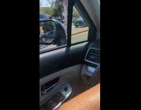 Car got stuck on road bollard barricade