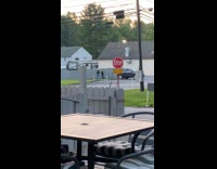 Collab IITW - Couple in black shirt poses behind vehicle