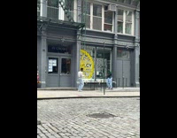 Man green top dance wheelchair walkway music