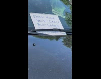 Note left on windshield asks driver to move car up