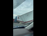 Person films truck thats been squashed