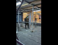 Shirtless guy in clown mask does workout 