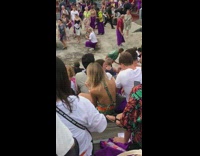 Green dress girl takes selfies temple performance