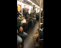 Guy in wheelchair bobs head to music 