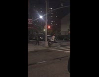 Violent man tosses bin and bangs stick