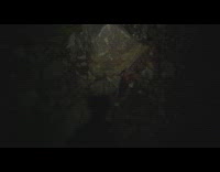 Guy cave grey rock glows gold dark