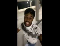 Guy outside at night running yeah I run track