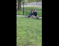 Lady in Black Ears Barks at Couple on Rock 